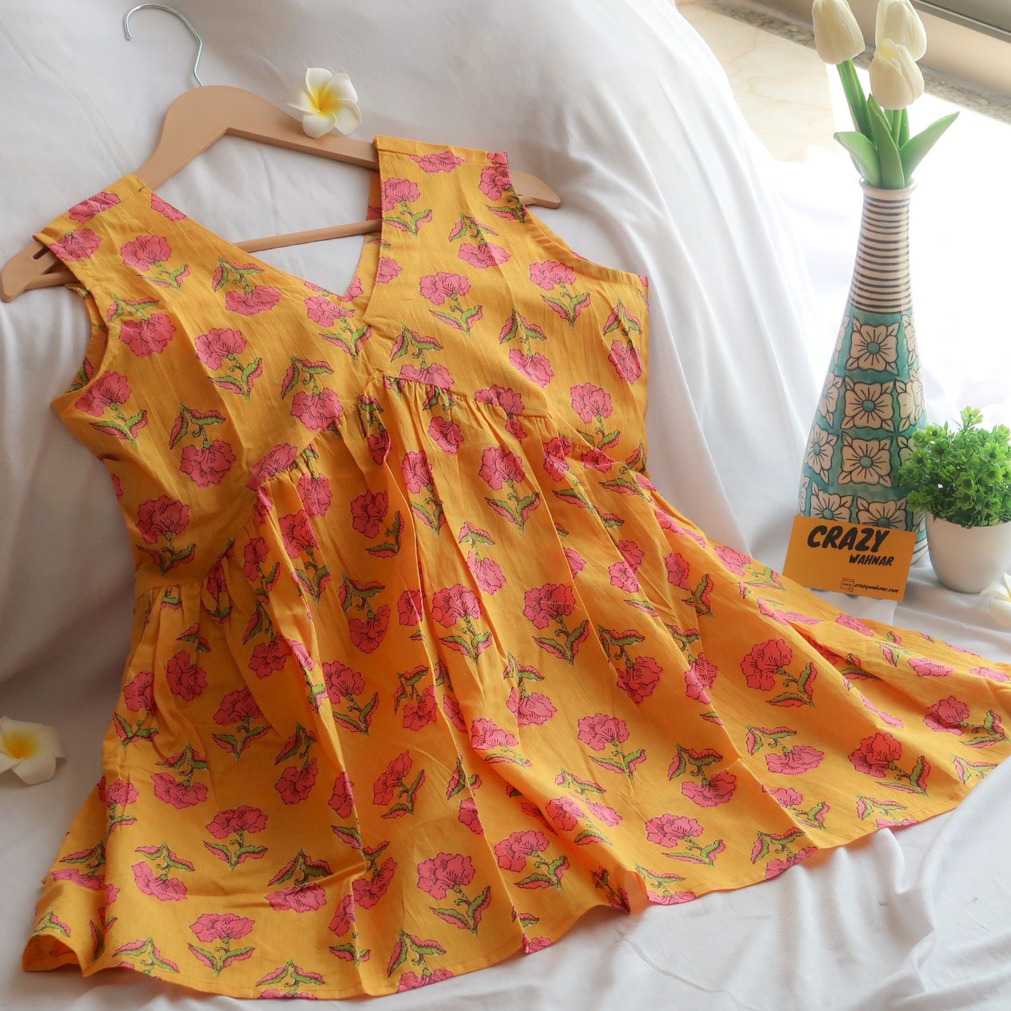 Floral Zest Sleeveless Peplum Top Short Kurti