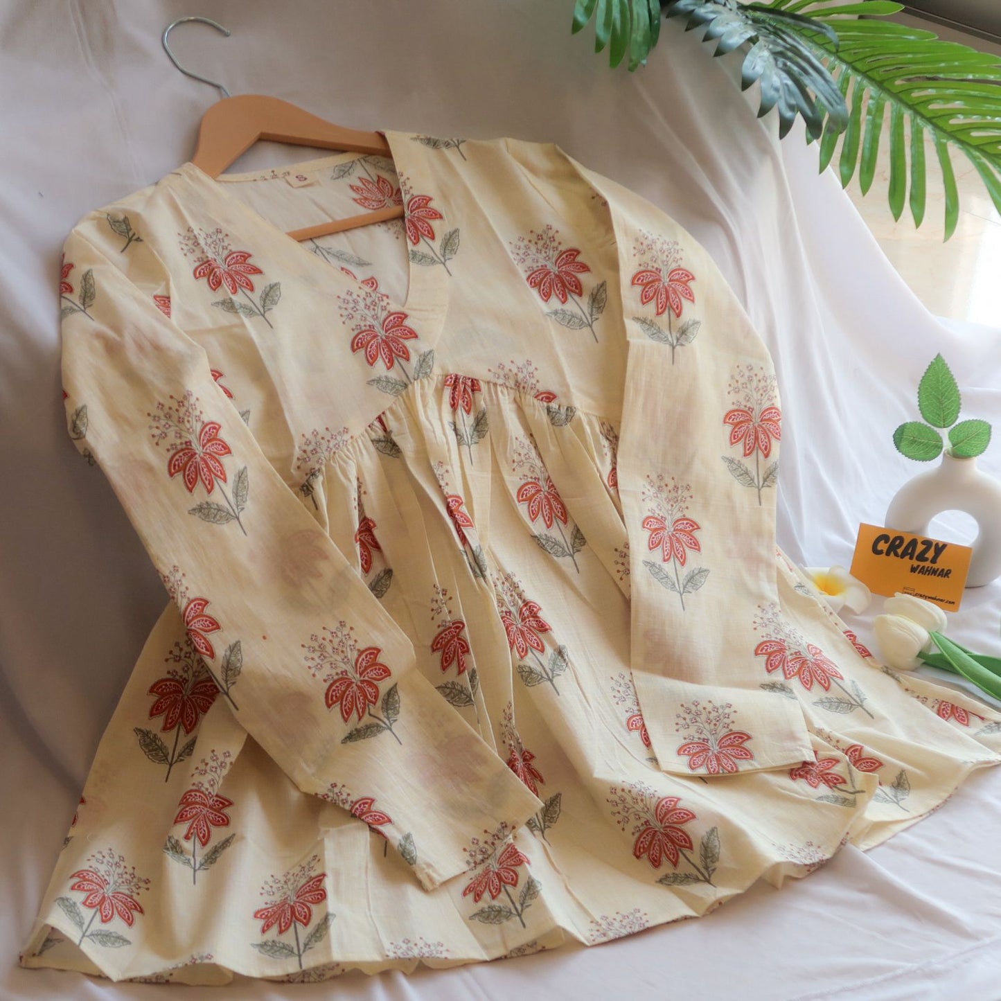 Creamy Elegance Peplum Top Full Sleeves Short Kurti
